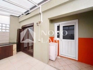 Casa em condomínio no Bairro Camaquã ? conforto, praticidade e ótima opção de permuta - Geniale Imóveis